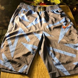 Nike Kyrie Irving Athletic Shorts with Blue Graphic and Orange Swoosh